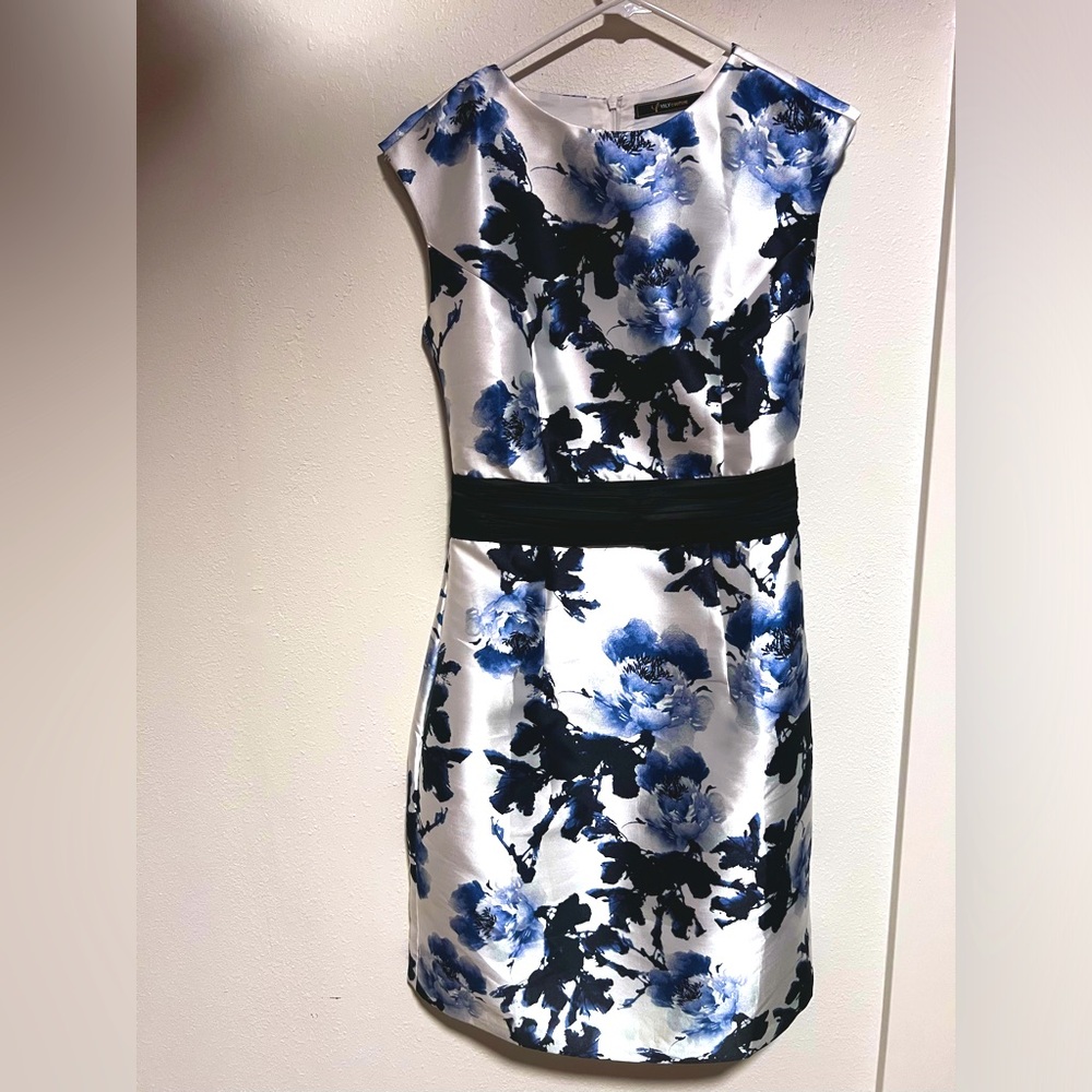Several dresses, sweaters, and one-pieces
